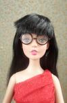doll head, glasses, wig