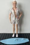 Mattel - Barbie - Barbie The Movie - Ken Wearing Pastel Striped Beach Matching Set