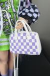 in white/lilac checks