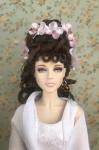 doll, headpiece and earrings
