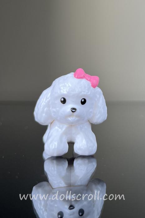 Poodle with bow